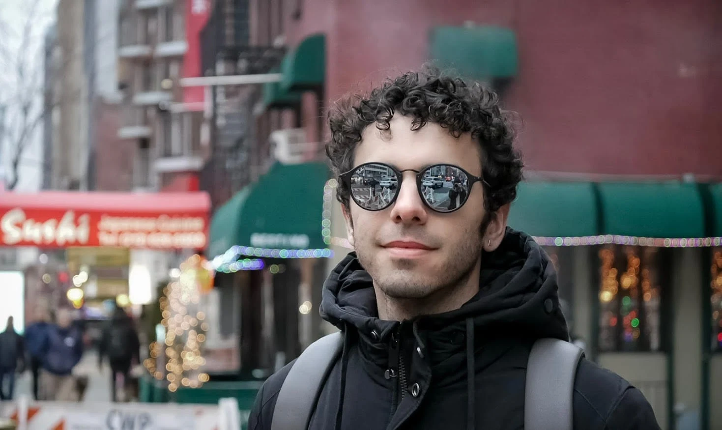 Pedro Veloso standing outdoors in an urban setting